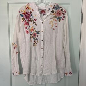 Absolutely gorgeous button-down from Jonny was white linen with floral design